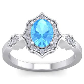 1 3/4 Carat Oval Shape Blue Topaz and Diamond Ring In 14 Karat White Gold