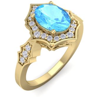 1 3/4 Carat Oval Shape Blue Topaz and Diamond Ring In 14 Karat Yellow Gold