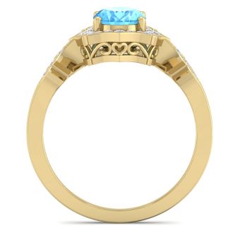 1 3/4 Carat Oval Shape Blue Topaz and Diamond Ring In 14 Karat Yellow Gold