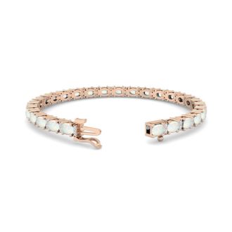 Opal Bracelet With 4 1/2 Carats of Oval Shape Opals and Diamonds In 14 Karat Rose Gold, 7 Inches