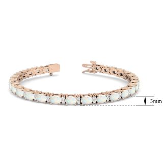Opal Bracelet With 4 1/2 Carats of Oval Shape Opals and Diamonds In 14 Karat Rose Gold, 7 Inches