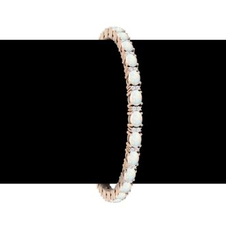 Opal Bracelet With 4 1/2 Carats of Oval Shape Opals and Diamonds In 14 Karat Rose Gold, 7 Inches