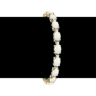 Opal Bracelet With 6 Carats of Oval Shape Opals and Diamonds In 14 Karat Yellow Gold, 7 Inches