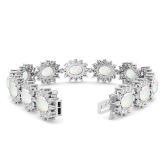 Opal Bracelet With 14 1/4 Carats of Oval Shape Opals and Diamonds In 14 Karat White Gold, 7 Inches
