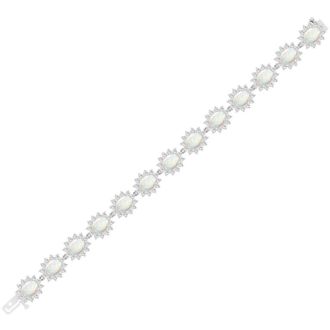 Opal Bracelet With 14 1/4 Carats of Oval Shape Opals and Diamonds In 14 Karat White Gold, 7 Inches