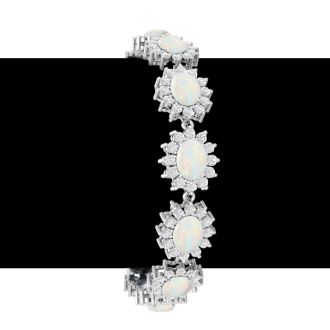 Opal Bracelet With 14 1/4 Carats of Oval Shape Opals and Diamonds In 14 Karat White Gold, 7 Inches