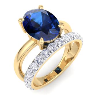 3.60 Carat Oval Shape Sapphire and Halo Diamond Ring Plus Band In 14 Karat Yellow Gold