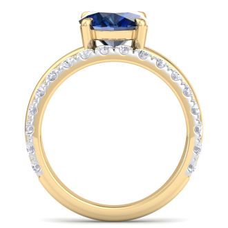 3.60 Carat Oval Shape Sapphire and Halo Diamond Ring Plus Band In 14 Karat Yellow Gold