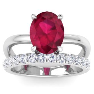 3.60 Carat Oval Shape Ruby and Halo Diamond Ring Plus Band In 14 Karat White Gold
