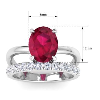 3.60 Carat Oval Shape Ruby and Halo Diamond Ring Plus Band In 14 Karat White Gold