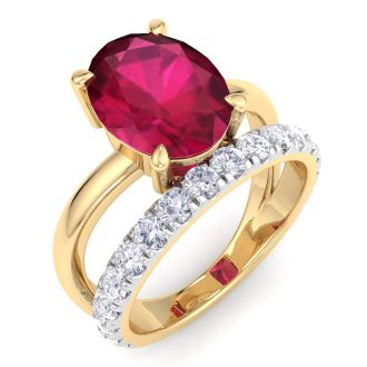 3.60 Carat Oval Shape Ruby and Halo Diamond Ring Plus Band In 14 Karat Yellow Gold