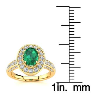 Estate Jewelry - 1/2 Carat Oval Shape Emerald and Halo Diamond Ring In 14 Karat Yellow Gold, Size 7.5