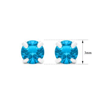 1/4 Carat Blue Topaz Stud Earrings In White Gold
