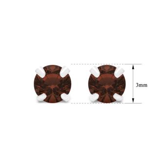 1/4 Carat Garnet Stud Earrings In White Gold