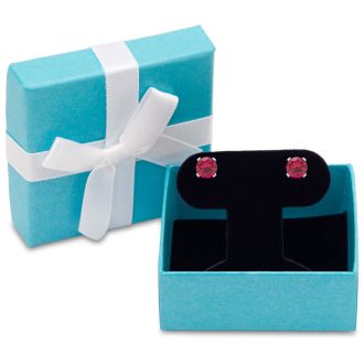 1 1/2 Carat Ruby Stud Earrings In White Gold