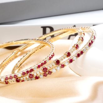 Estate Jewelry 14 Karat Yellow Gold 1 1/2 Carat Ruby and Diamond Tennis Bracelet