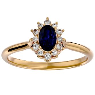 3/4 Carat Oval Shape Sapphire and Halo Diamond Ring In 14 Karat Yellow Gold