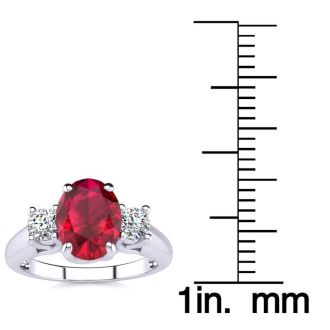 1 3/4 Carat Oval Shape Ruby and Two Diamond Ring In 14 Karat White Gold