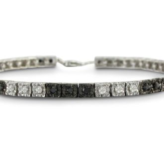Sterling silver black diamond tennis bracelet with 50 alternating black and white diamonds.  Diamond content is 1 carat in  J/K color I2 clarity.