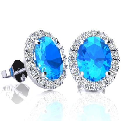 3 1/4 Carat Oval Shape Blue Topaz and Halo Diamond Stud Earrings In 14 Karat White Gold
