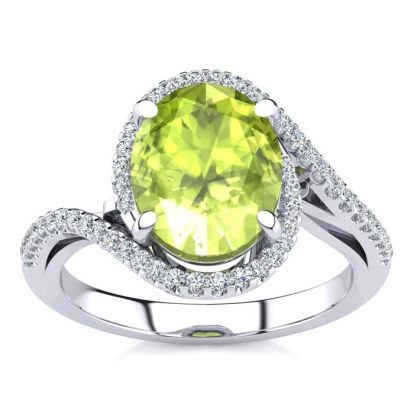 2 3/4 Carat Oval Shape Peridot and Halo Diamond Ring In 14 Karat White Gold