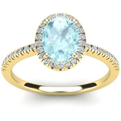 Aquamarine Ring: Aquamarine Jewelry: 1 1/3 Carat Oval Shape Aquamarine and Halo Diamond Ring In 14 Karat Yellow Gold