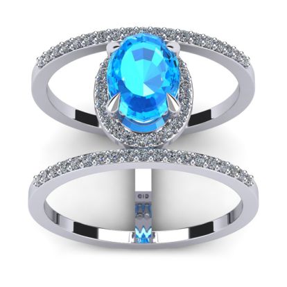 1 3/4 Carat Oval Shape Blue Topaz and Halo Diamond Spacer Ring In 14 Karat White Gold