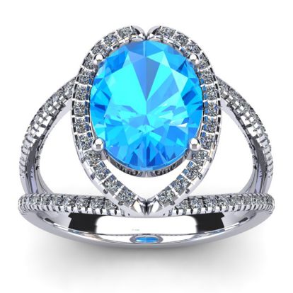 3 3/4 Carat Oval Shape Blue Topaz and Halo Diamond Ring In 14 Karat White Gold