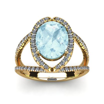 Aquamarine Ring: Aquamarine Jewelry: 2 3/4 Carat Oval Shape Aquamarine and Halo Diamond Ring In 14 Karat Yellow Gold