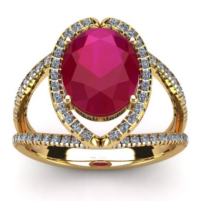 3 1/2 Carat Oval Shape Ruby and Halo Diamond Ring In 14 Karat Yellow Gold