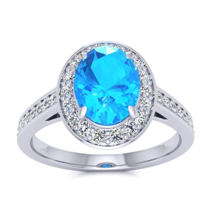 1 3/4 Carat Oval Shape Blue Topaz and Halo Diamond Ring In 14 Karat White Gold