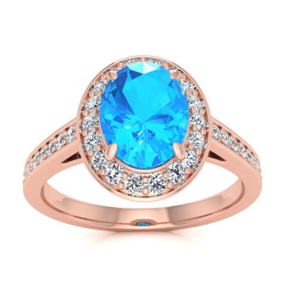 1 3/4 Carat Oval Shape Blue Topaz and Halo Diamond Ring In 14 Karat Rose Gold