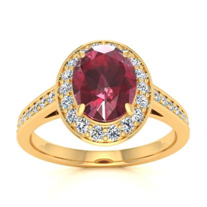 1 3/4 Carat Oval Shape Ruby and Halo Diamond Ring In 14 Karat Yellow Gold