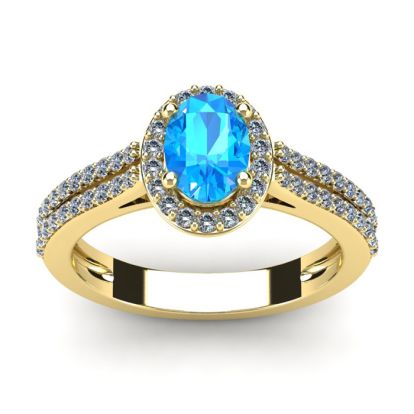 1 1/2 Carat Oval Shape Blue Topaz and Halo Diamond Ring In 14 Karat Yellow Gold