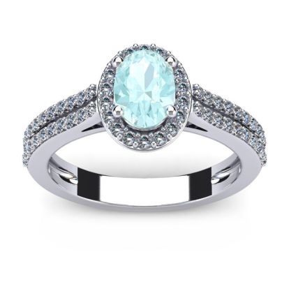 Aquamarine Ring: Aquamarine Jewelry: 1 1/4 Carat Oval Shape Aquamarine and Halo Diamond Ring In 14 Karat White Gold