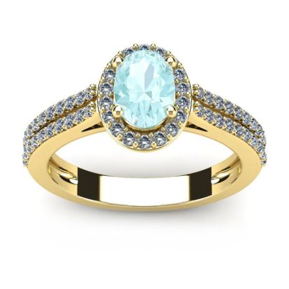 Aquamarine Ring: Aquamarine Jewelry: 1 1/4 Carat Oval Shape Aquamarine and Halo Diamond Ring In 14 Karat Yellow Gold