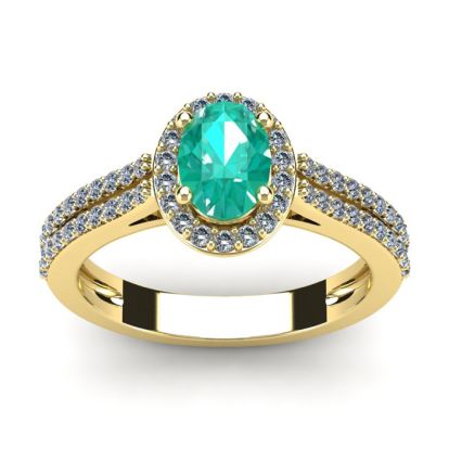 1 1/4 Carat Oval Shape Emerald and Halo Diamond Ring In 14 Karat Yellow Gold