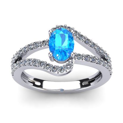 1 1/2 Carat Oval Shape Blue Topaz and Fancy Diamond Ring In 14 Karat White Gold
