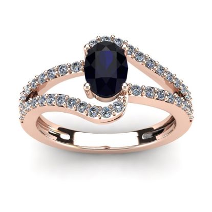 1 1/2 Carat Oval Shape Sapphire and Fancy Diamond Ring In 14 Karat Rose Gold
