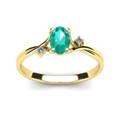 1/2 Carat Oval Shape Emerald and Two Diamond Accent Ring In 14 Karat Yellow Gold