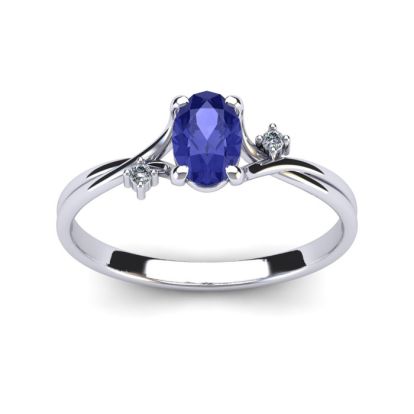 1/2 Carat Oval Shape Tanzanite and Two Diamond Accent Ring In 14 Karat White Gold