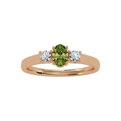 3/4 Carat Oval Shape Peridot and Two Diamond Ring In 14 Karat Rose Gold