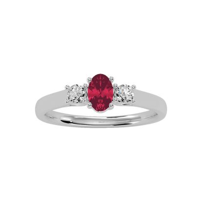 3/4 Carat Oval Shape Ruby and Two Diamond Ring In 14 Karat White Gold