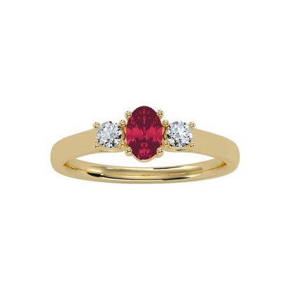 3/4 Carat Oval Shape Ruby and Two Diamond Ring In 14 Karat Yellow Gold