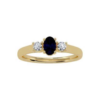 3/4 Carat Oval Shape Sapphire and Two Diamond Ring In 14 Karat Yellow Gold