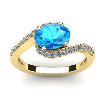 1 3/4 Carat Oval Shape Blue Topaz and Halo Diamond Ring In 14 Karat Yellow Gold