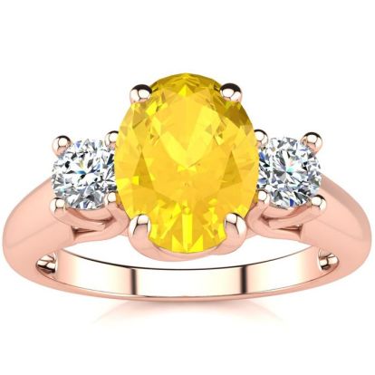 1 1/4 Carat Oval Shape Citrine and Two Diamond Ring In 14 Karat Rose Gold