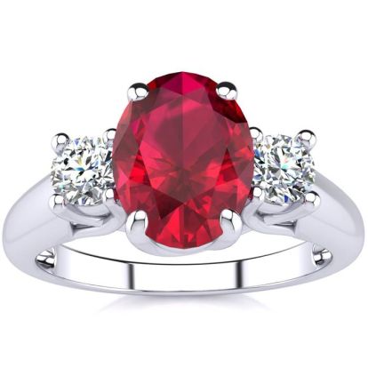 1 3/4 Carat Oval Shape Ruby and Two Diamond Ring In 14 Karat White Gold