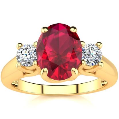 1 3/4 Carat Oval Shape Ruby and Two Diamond Ring In 14 Karat Yellow Gold