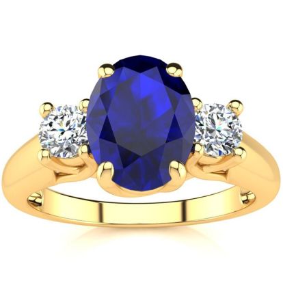 1 3/4 Carat Oval Shape Sapphire and Two Diamond Ring In 14 Karat Yellow Gold